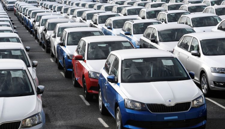 Volkswagen export cars are seen in the port of Emden, beside the VW plant, Germany March 9, 2018. REUTERS/Fabian Bimmer - RC1C7C85E320