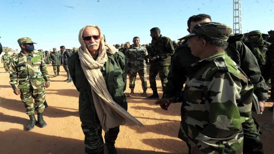 Tindouf (Algeria), 13/12/2022.- Brahim Ghali, President of the Sahrawi Arab Democratic Republic (SARD) and Secretary-General of the Polisario front, (C) arrives to attend a Polisario congress at the refugee camp of Dakhla, which lies some 170km of Tindouf, to the southeast of Algiers, Algeria on 13 January 2023. The Polisario movement, which seeks independence in disputed Western Sahara, started meeting on 13 January for leadership elections. More than 2,200 members of the movement and 370 foreign guests are attending the five-day congress deep in Algeria's desert, at a Sahrawi refugee camp named after Dakhla, (Elecciones, Sáhara Occidental, Argel) EFE/EPA/STR